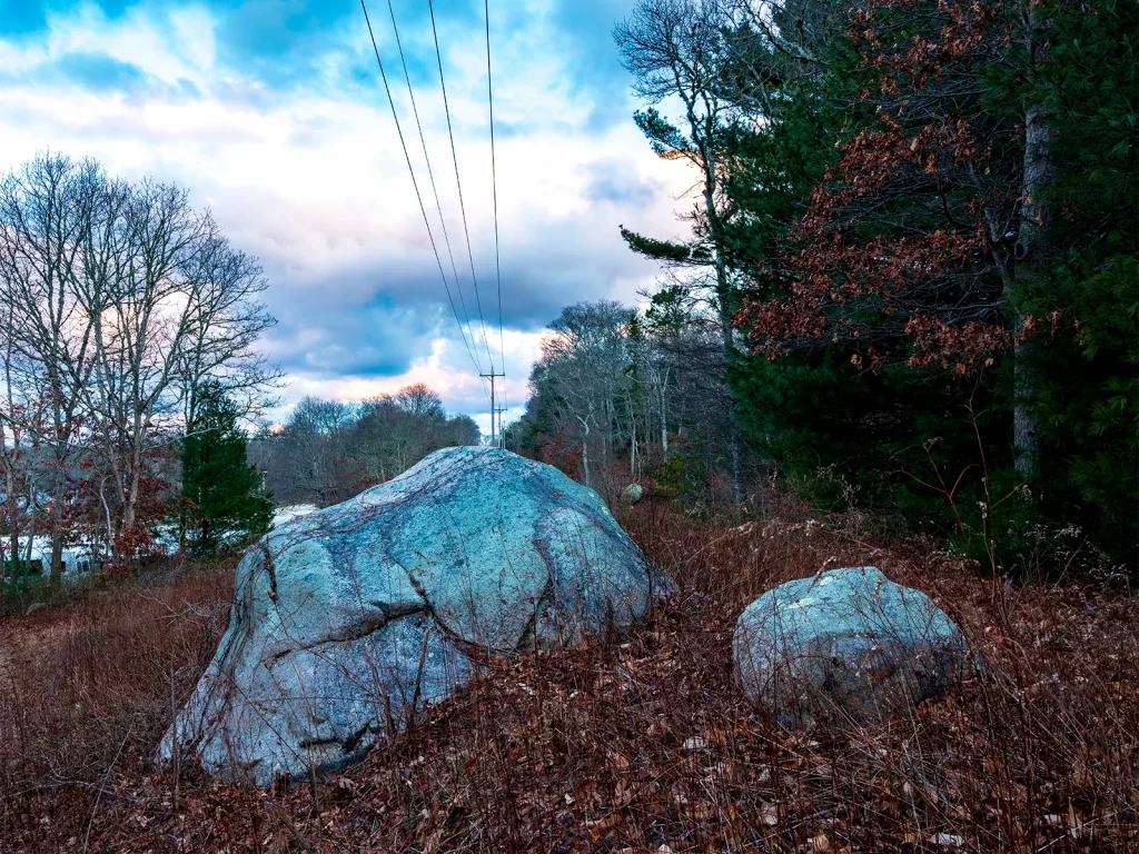 power lines over large boulders